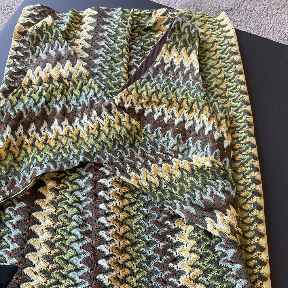 One of a kind designed dress in a very cool fabric. Size small